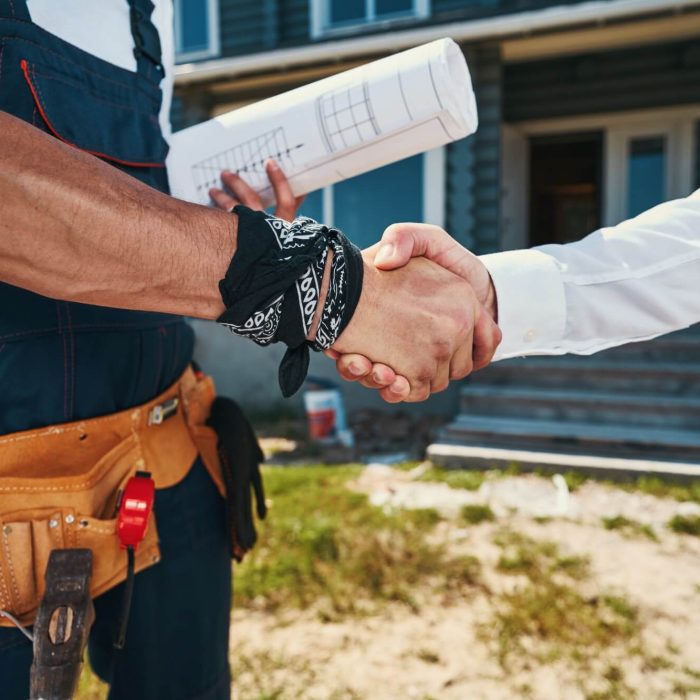 engineers-agreeing-on-construction-plan-with-handshake.jpg